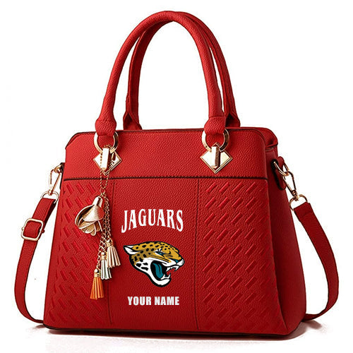 LIMITED EDITION - NEW CUSTOMIZED NFL30 JSJ JACKSONVILLE JAGUARS HANDBAG IN MULTIPLE COLORS