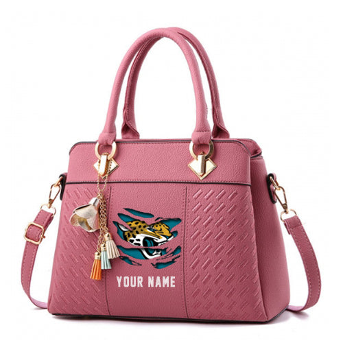 LIMITED EDITION - NEW CUSTOMIZED NFL30 JSJ JACKSONVILLE JAGUARS HANDBAG IN MULTIPLE COLORS