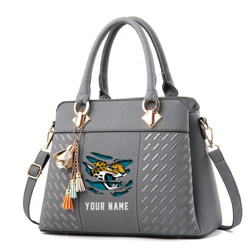 LIMITED EDITION - NEW CUSTOMIZED NFL30 JSJ JACKSONVILLE JAGUARS HANDBAG IN MULTIPLE COLORS