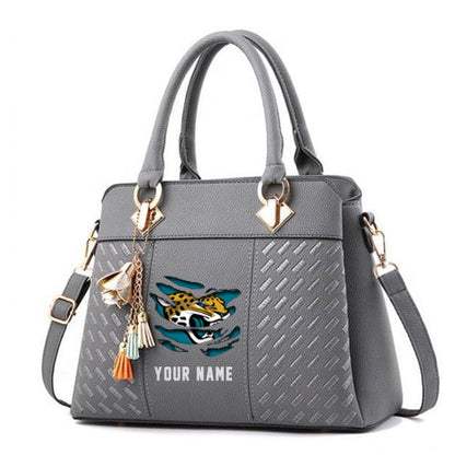LIMITED EDITION - NEW CUSTOMIZED NFL30 JSJ JACKSONVILLE JAGUARS HANDBAG IN MULTIPLE COLORS