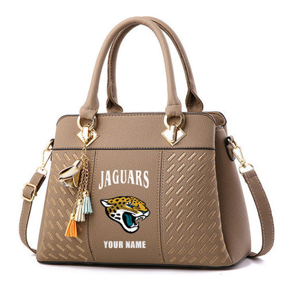 LIMITED EDITION - NEW CUSTOMIZED NFL30 JSJ JACKSONVILLE JAGUARS HANDBAG IN MULTIPLE COLORS