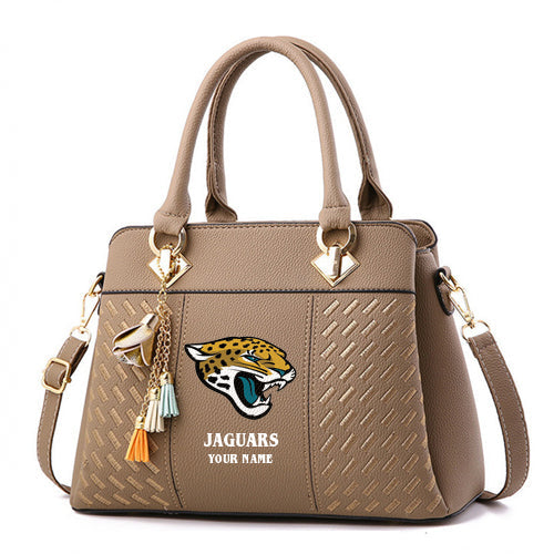LIMITED EDITION - NEW CUSTOMIZED NFL30 JSJ JACKSONVILLE JAGUARS HANDBAG IN MULTIPLE COLORS