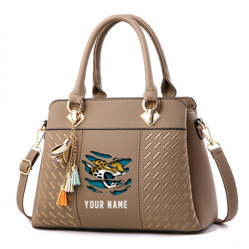LIMITED EDITION - NEW CUSTOMIZED NFL30 JSJ JACKSONVILLE JAGUARS HANDBAG IN MULTIPLE COLORS