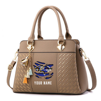 LIMITED EDITION - NEW CUSTOMIZED NFL28 BTR BALTIMORE RAVENS HANDBAG IN MULTIPLE COLORS