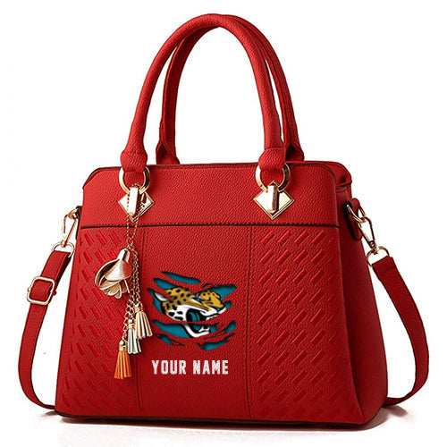 LIMITED EDITION - NEW CUSTOMIZED NFL30 JSJ JACKSONVILLE JAGUARS HANDBAG IN MULTIPLE COLORS