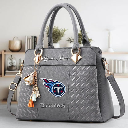 LIMITED EDITION - NEW CUSTOMIZED NFL31 TST TENNESSEE TITANS LUXURY HANDBAG IN MULTIPLE COLORS