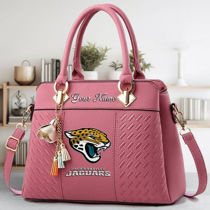 LIMITED EDITION - NEW CUSTOMIZED NFL30 JSJ JACKSONVILLE JAGUARS LUXURY HANDBAG IN MULTIPLE COLORS