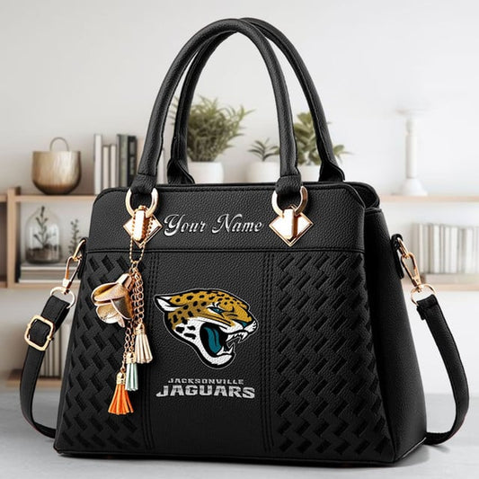 LIMITED EDITION - NEW CUSTOMIZED NFL30 JSJ JACKSONVILLE JAGUARS LUXURY HANDBAG IN MULTIPLE COLORS